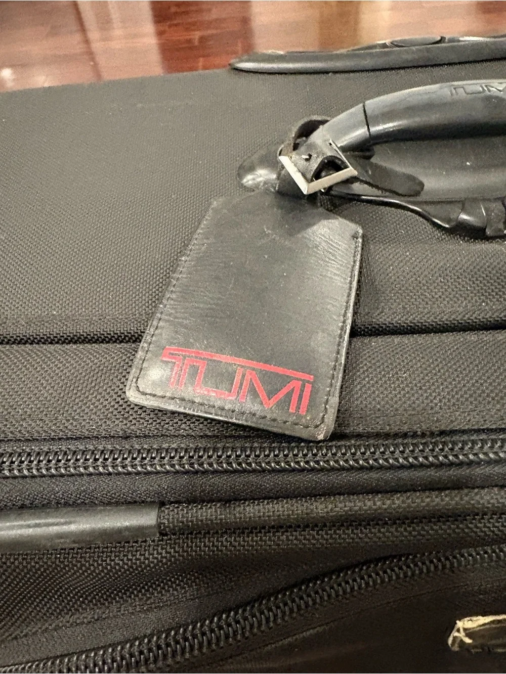 Tumi Black Rolling Expandable Travel Bag 26